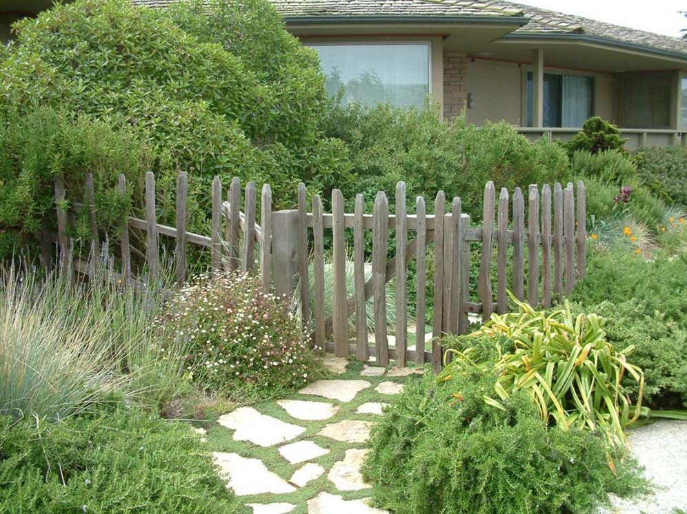 Gray Picket Fence and Landscape