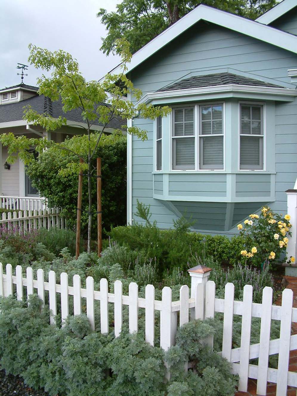 English Cottage Style with Picket Fence